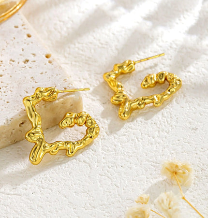 Liquid Heart Earrings in Gold Finish null