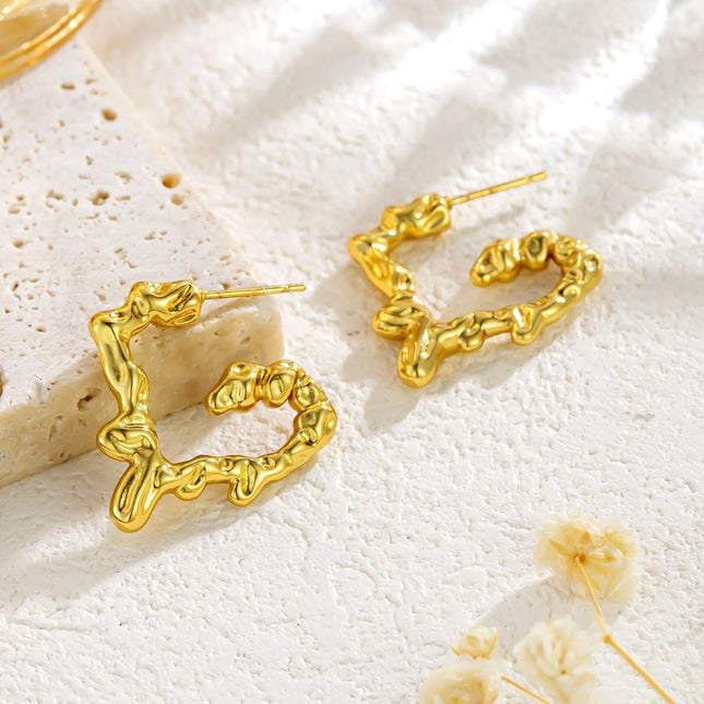 Liquid Heart Earrings in Gold Finish null