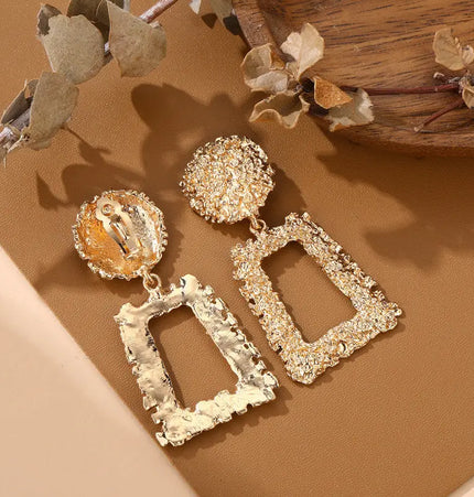 Bold geometric matte gold earrings null