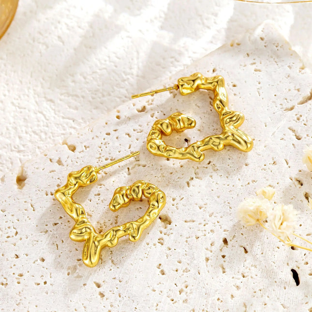 Liquid Heart Earrings in Gold Finish null