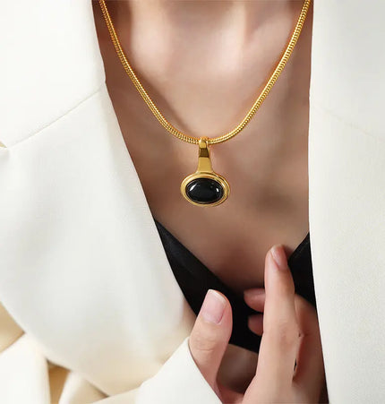 Gold-plated titanium steel necklace featuring a geometric micro glass bead Jewelry Europe Wholesale