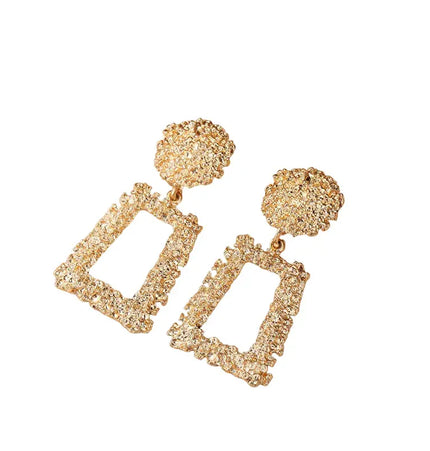 Bold geometric matte gold earrings null