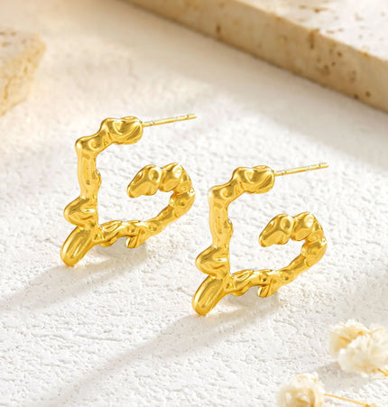 Liquid Heart Earrings in Gold Finish null