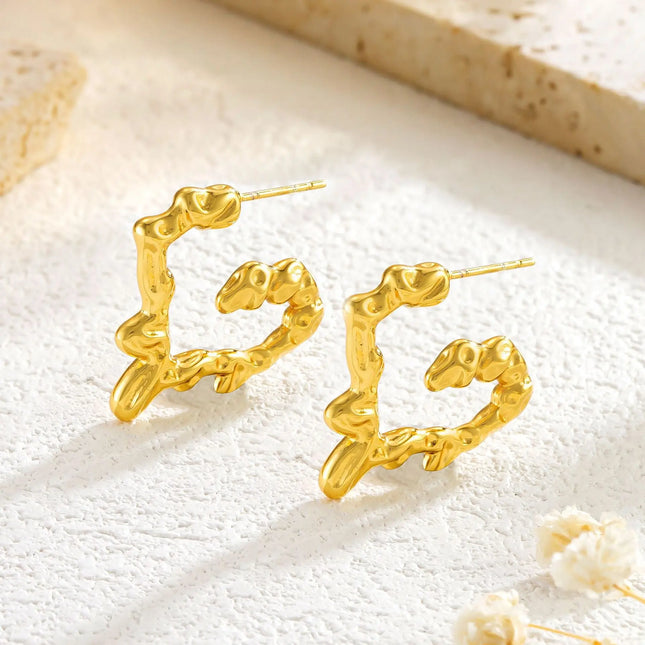 Liquid Heart Earrings in Gold Finish null