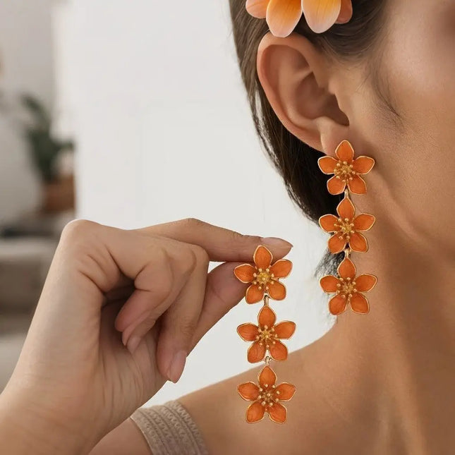 Fashionable Oil Dripping Four Petal Flower Earrings null