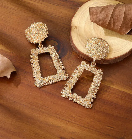 Bold geometric matte gold earrings null