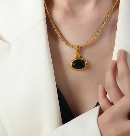 Gold-plated titanium steel necklace featuring a geometric micro glass bead Jewelry Europe Wholesale