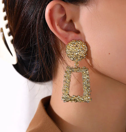 Bold geometric matte gold earrings null